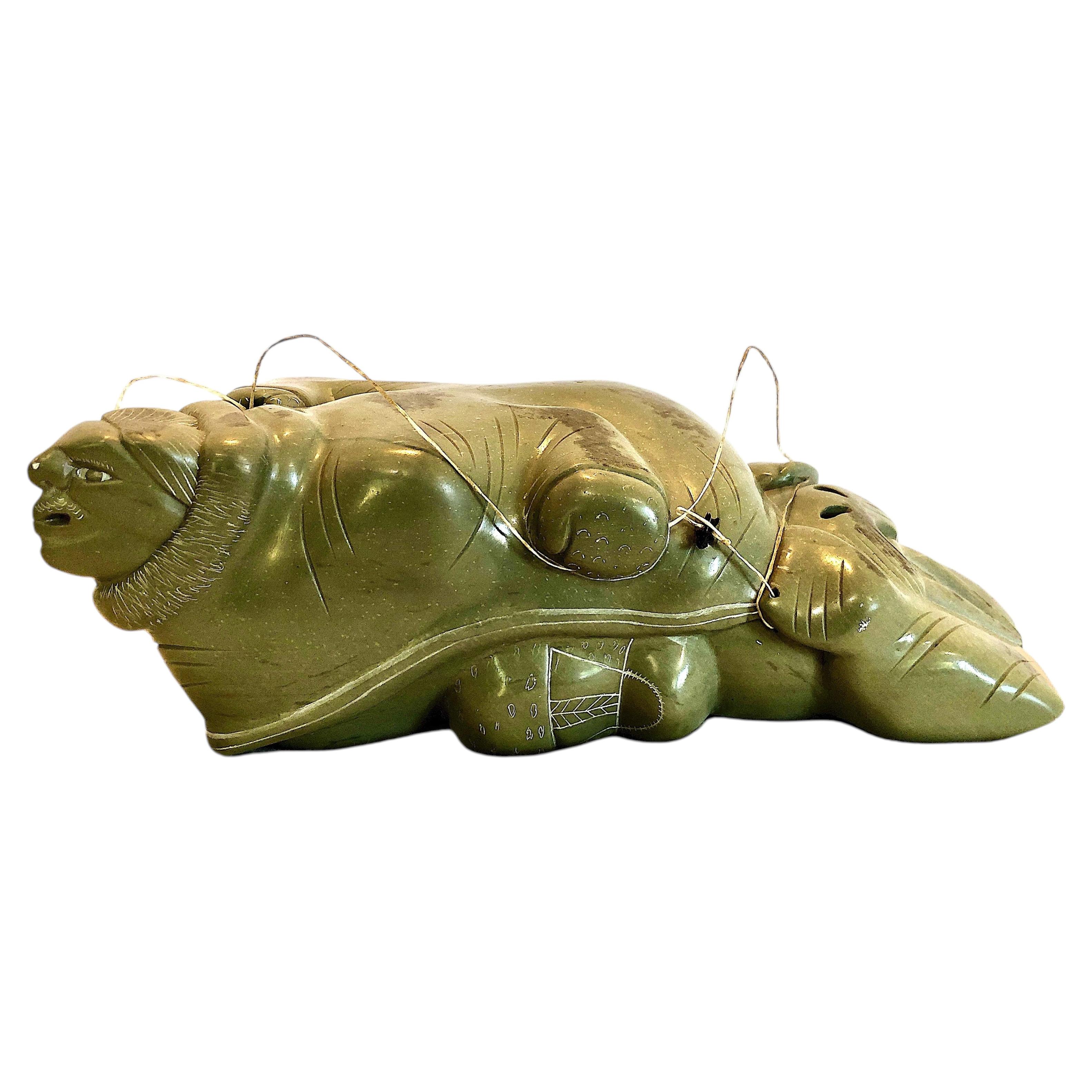 Inuit Stone Carving Merging Man and Walrus