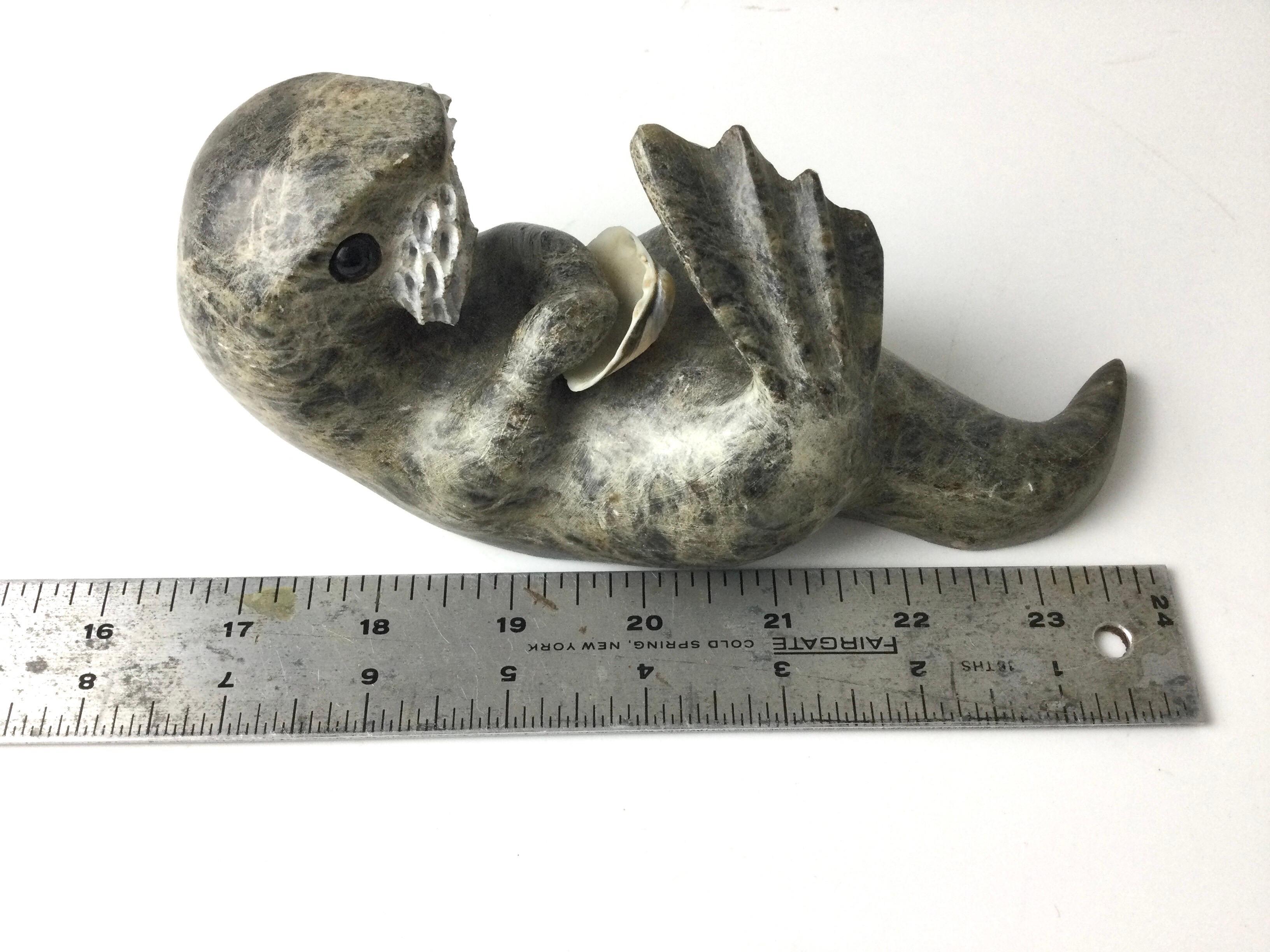 20th Century Inuit Stone Carving of a Otter with Shell Signed Drake For Sale