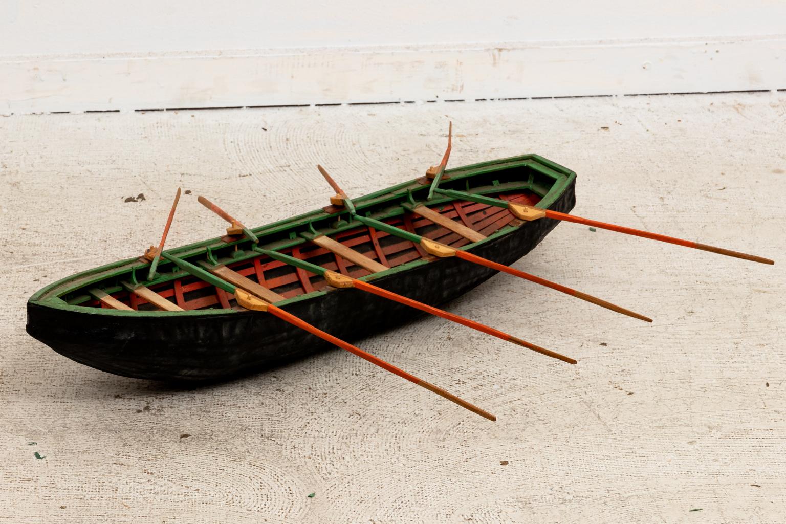 Circa early 20th century 26 inch model of an Inuit open sealskin boat called an 