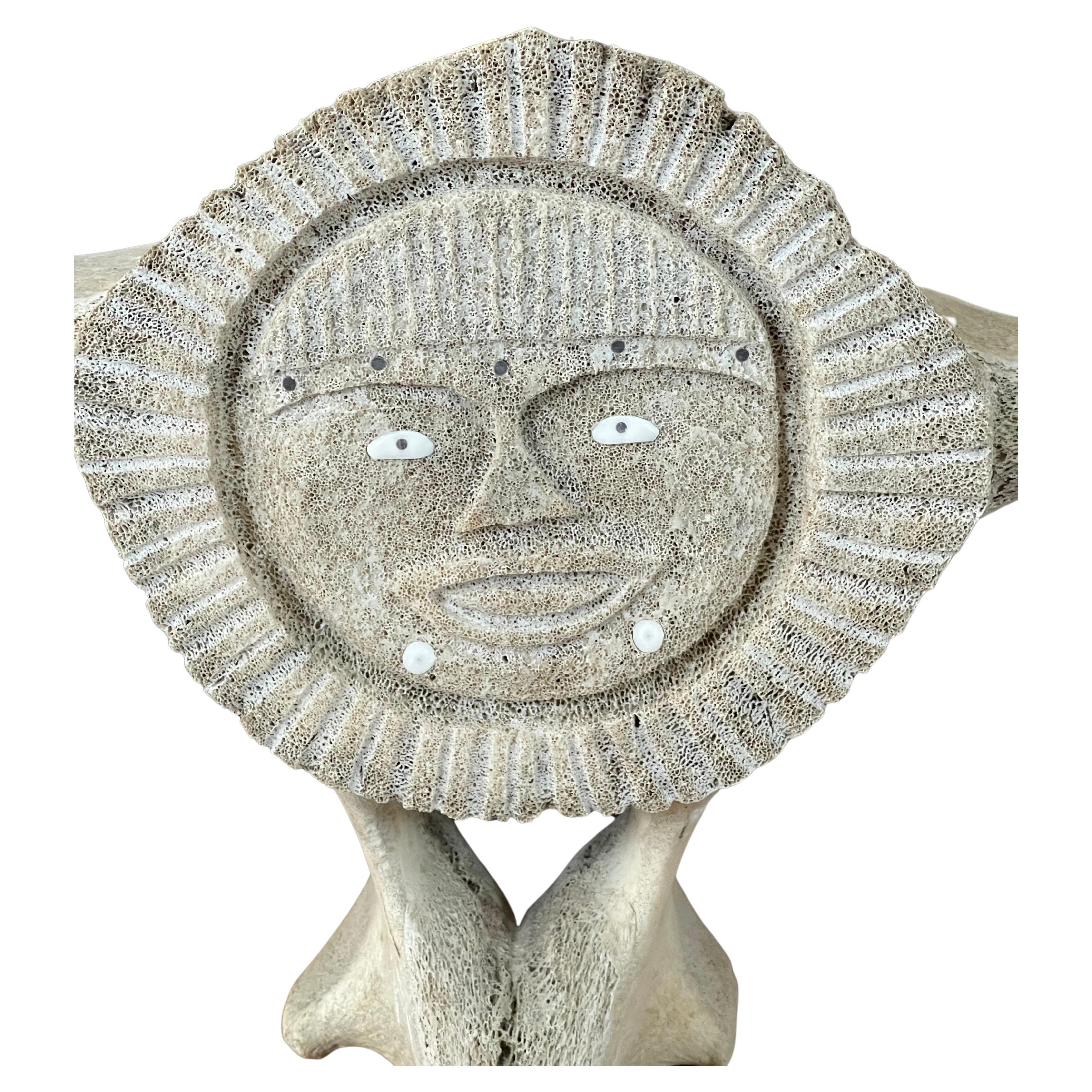 Incredible Inuit whale bone vertebrae hand carved two sided signed sculpture, circa 1980s. The sculpture is incredibly well done with two distinctly different carving on each side. The piece is in very good vintage condition and measures 25.5