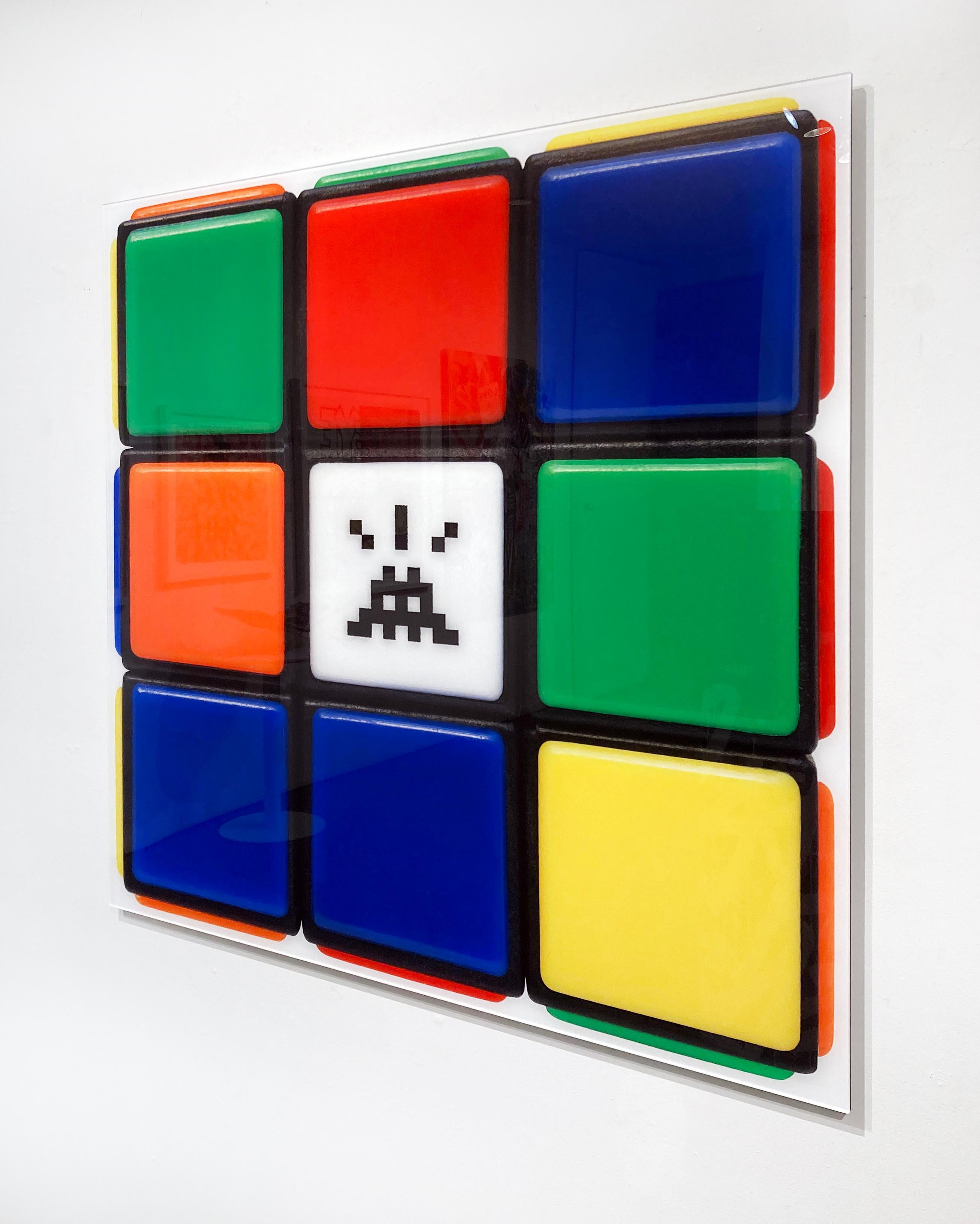 Artist:  Invader, 
Title:  Invaded Cube
Series:  Rubikcubism
Date:  2023
Medium:  Diasec-mounted Giclée on aluminium composite panel
Unframed Dimensions:  39.37