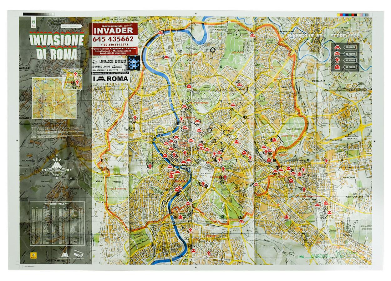 Print version of the Invader Rome Map. Never folded example.
Hand signed and numbered by Invader on bottom right of print in green ink.
Limited edition of only 50 never folded examples on premium paper.
Shows the location of all the Invader mosaics