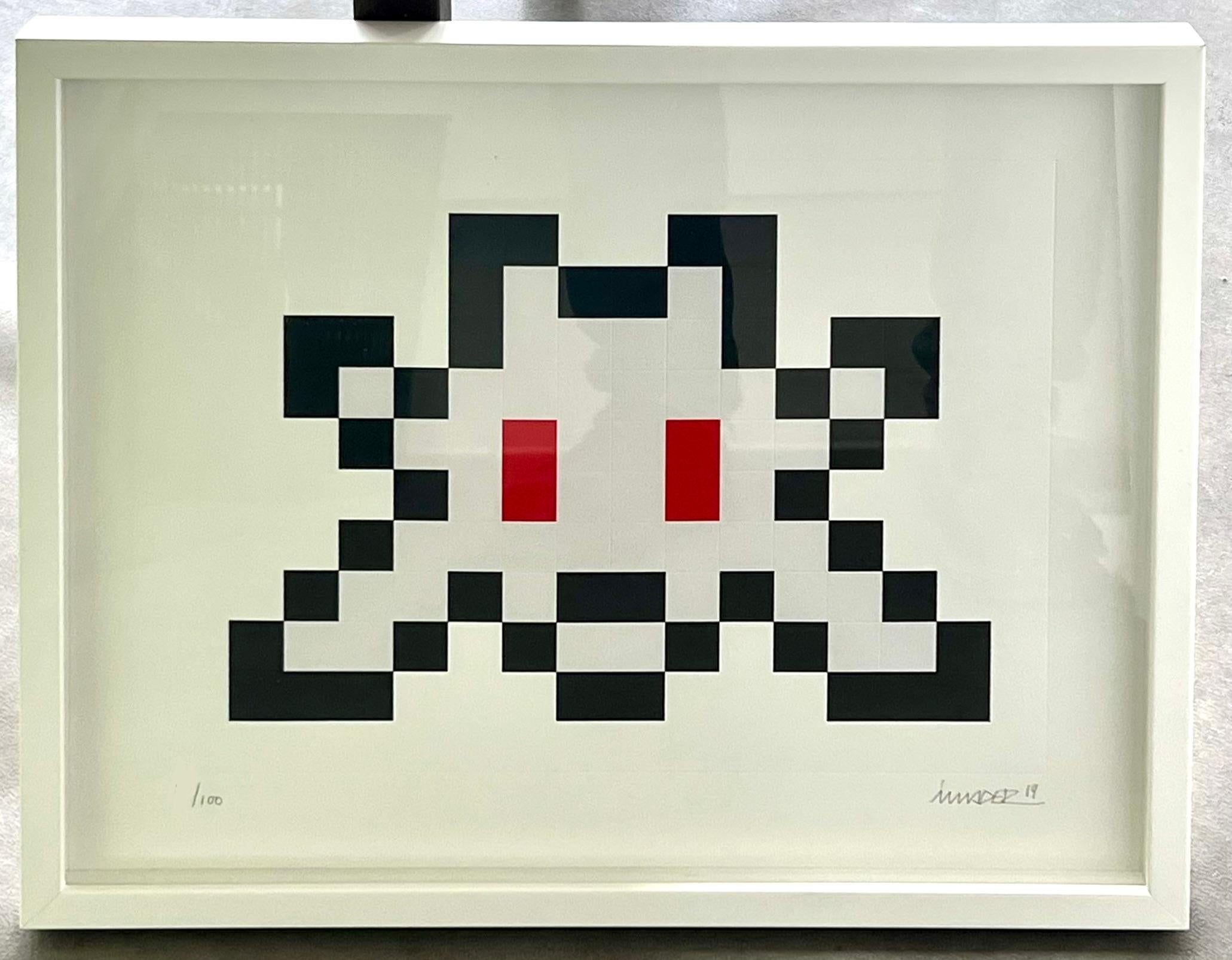 invader prints on paper