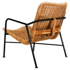 Inventive adjustable rattan armchair #514 by Dirk van Sliedregt, 1952.
