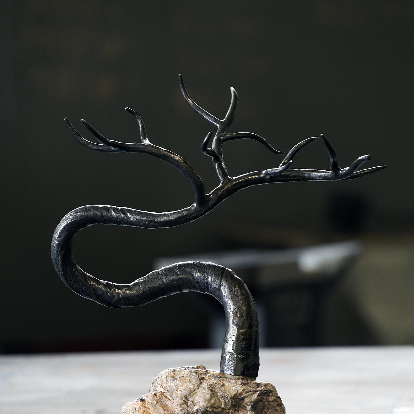 This spectacular iron bonsai is symbolic of winter (
