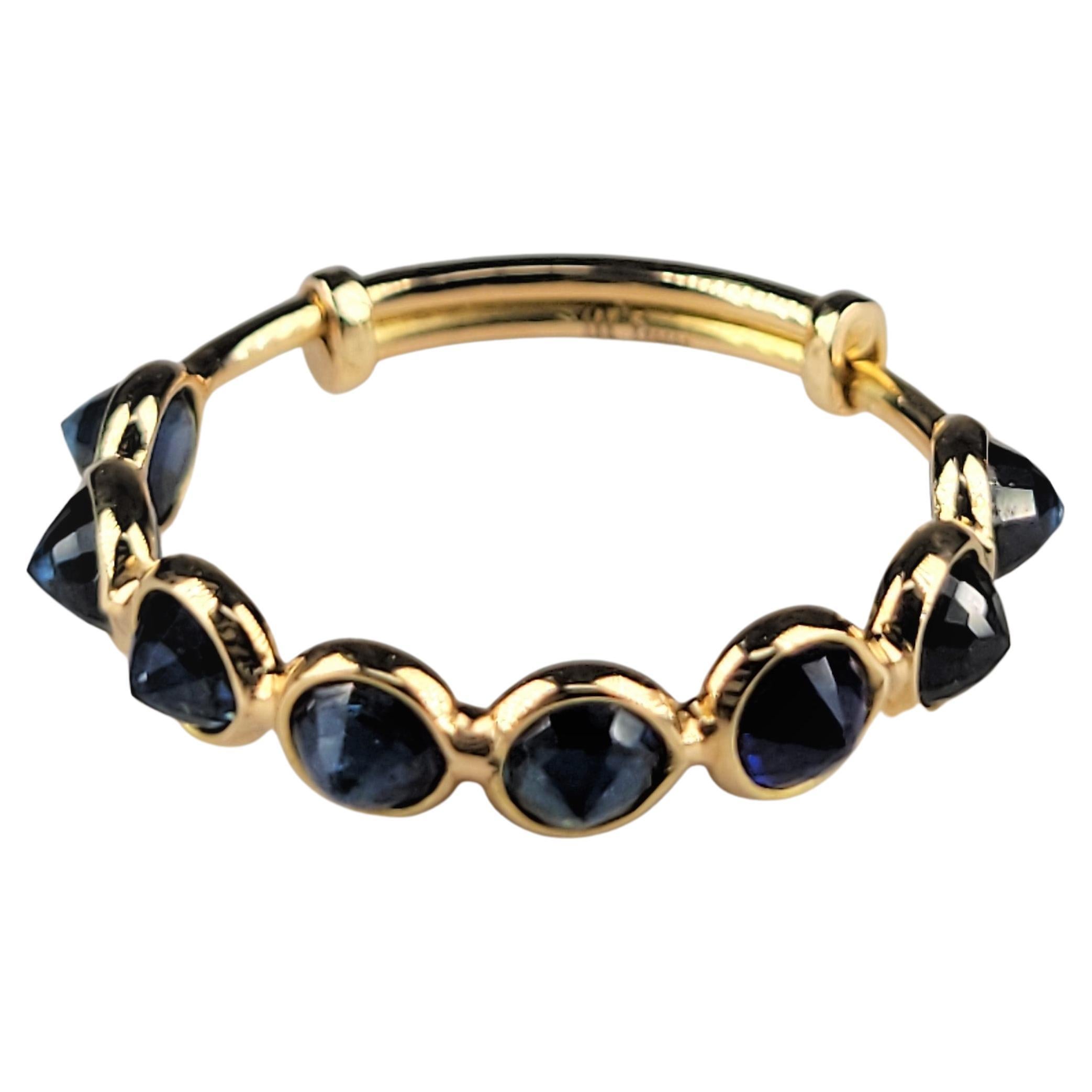 Anillo de oro amarillo con zafiro azul invertido
