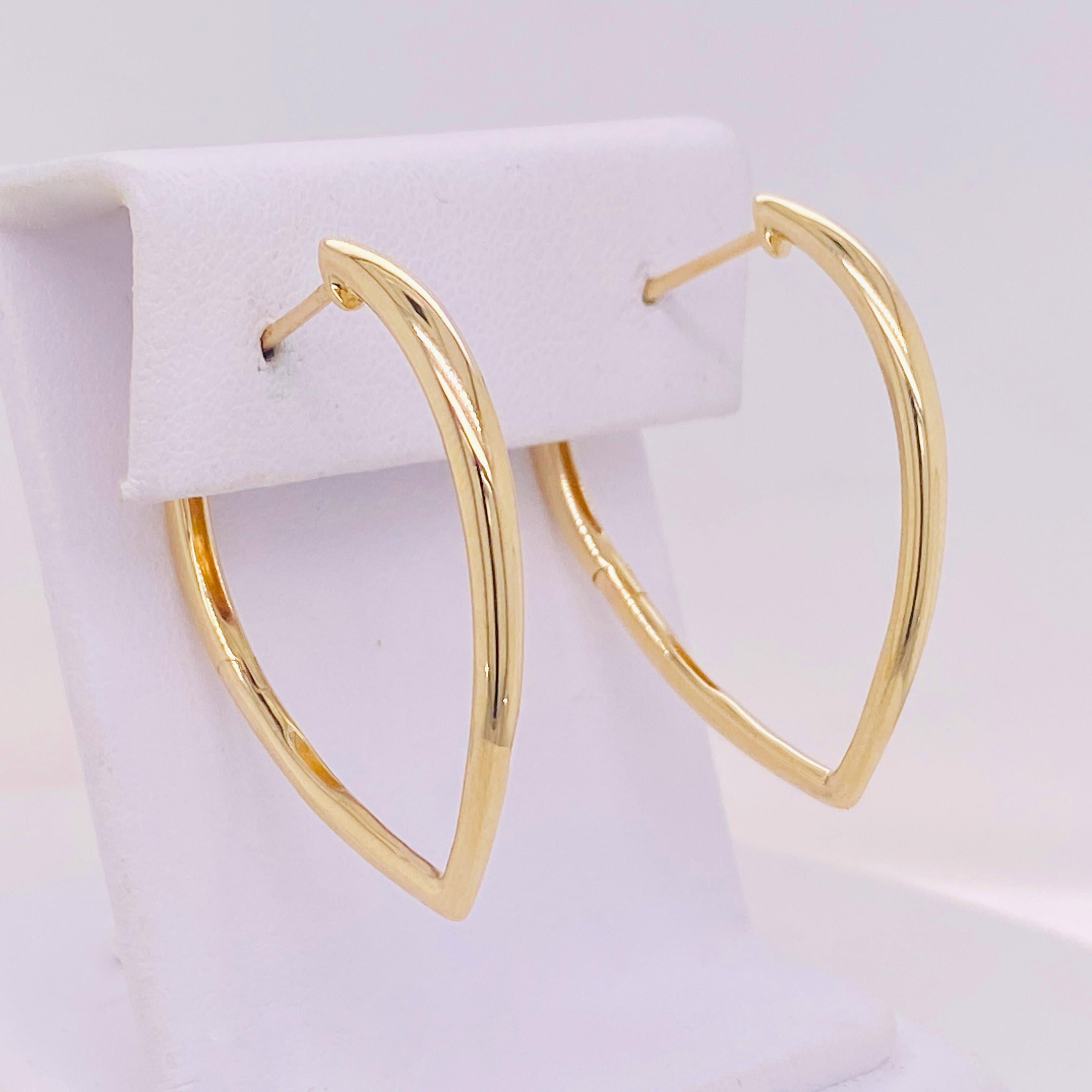 Show your stylish flair with this contemporary twist on classic hoop earrings! Vibrant contrast shines in the rounded hoop top that flares out then slims down into a rounded point to form an inverted droplet or pear shape. The cleanly bright solid