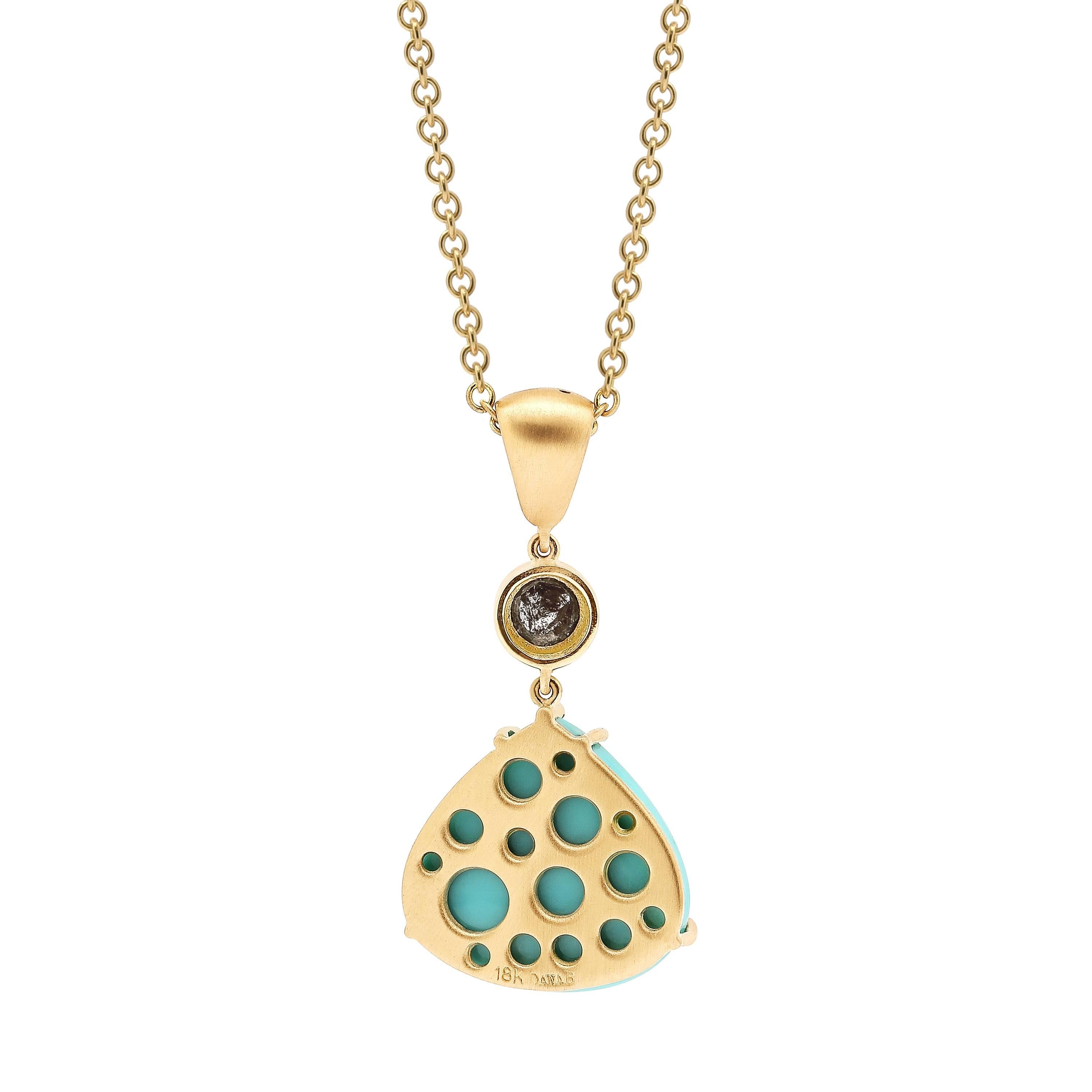 A simple but statement-making drop pendant, with a modern oculus 18 karat yellow gold bale, rose cut natural black diamond with plenty of fire, and soft heart-shaped baby blue sleeping beauty turquoise all move fluidly and compliment each other