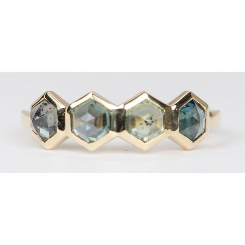 ♥ Inverted Set Hexagon Montana Sapphire Bezel Set 14K Yellow Gold Wedding Band
♥ Solid 14k yellow gold ring set with a beautiful hexagon-shaped montana sapphire
♥ Gorgeous blue green color!
♥ The item measures 5.7 mm in length, 17.2 mm in width, and