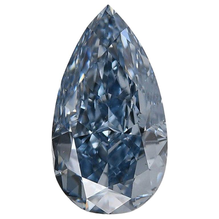 GIA Certified 1.01 Carat Fancy Vivid Blue Pear Cut Diamond VS