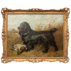 Inversión Óleo sobre lienzo. Retrato de un spaniel negro con un pato de John Emms