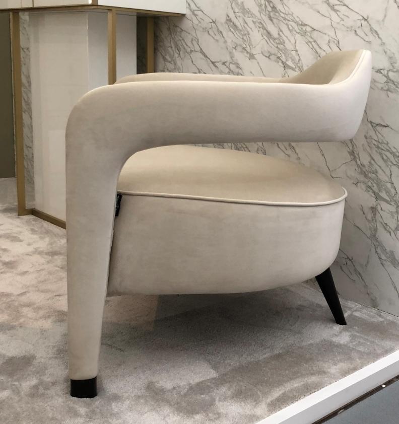 Contemporary Invicta Armchair with solid wood rear leg For Sale