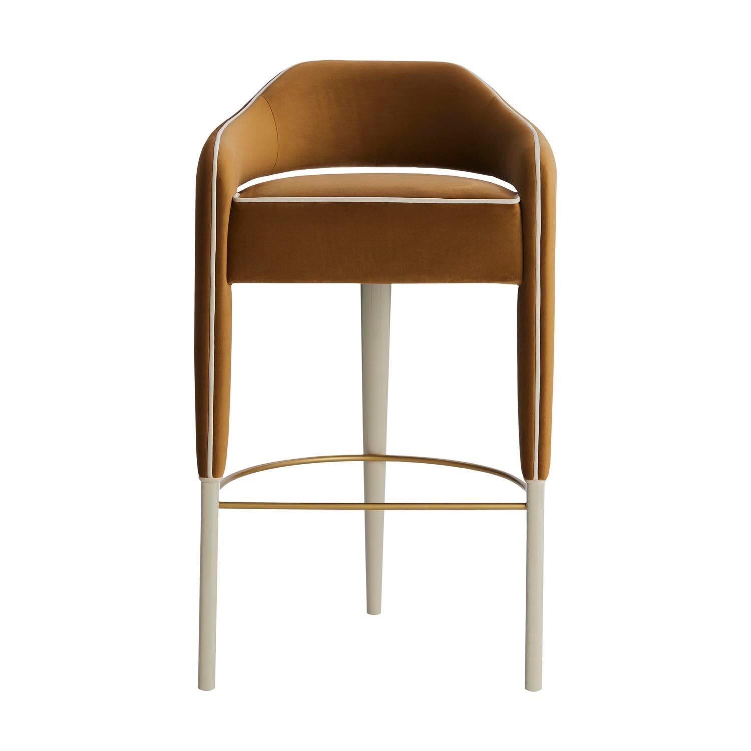 With a unique design, the INVICTA bar stool completely captures the attention.‎ Upholstered in fabric, this stool is made even more special by the beautiful detail of the seamless piping that runs from the back to the legs, finishing in a lacquered