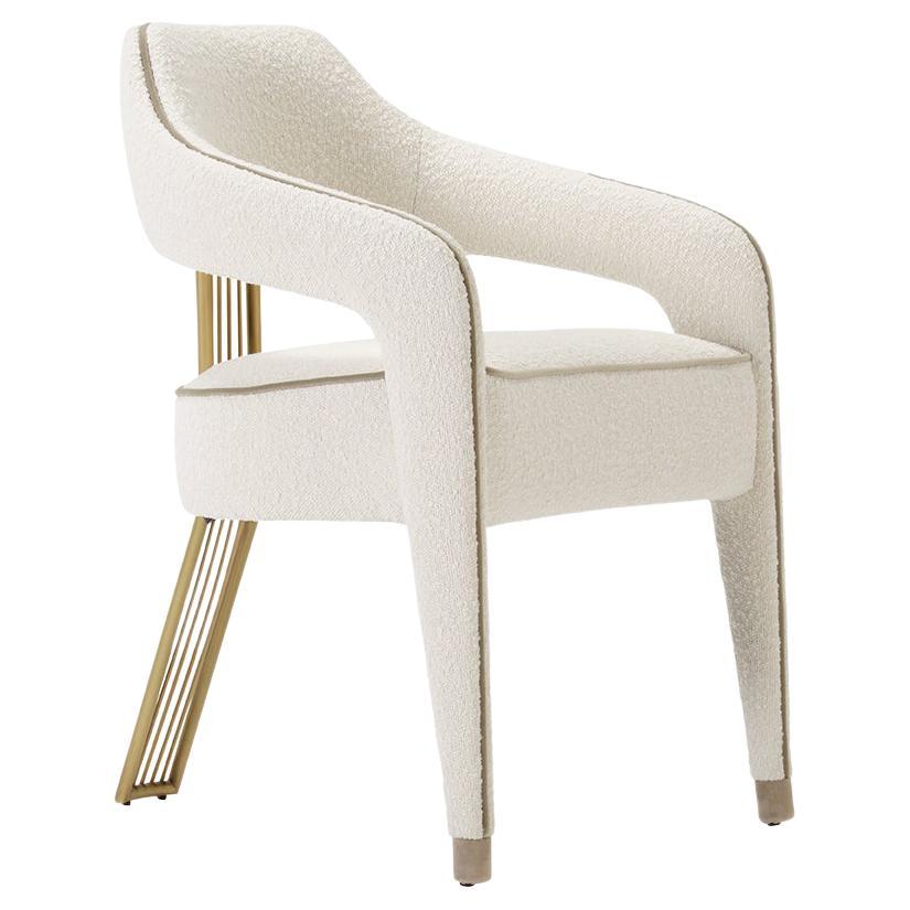 INVICTA II dining chair in white boucle and brass rear leg