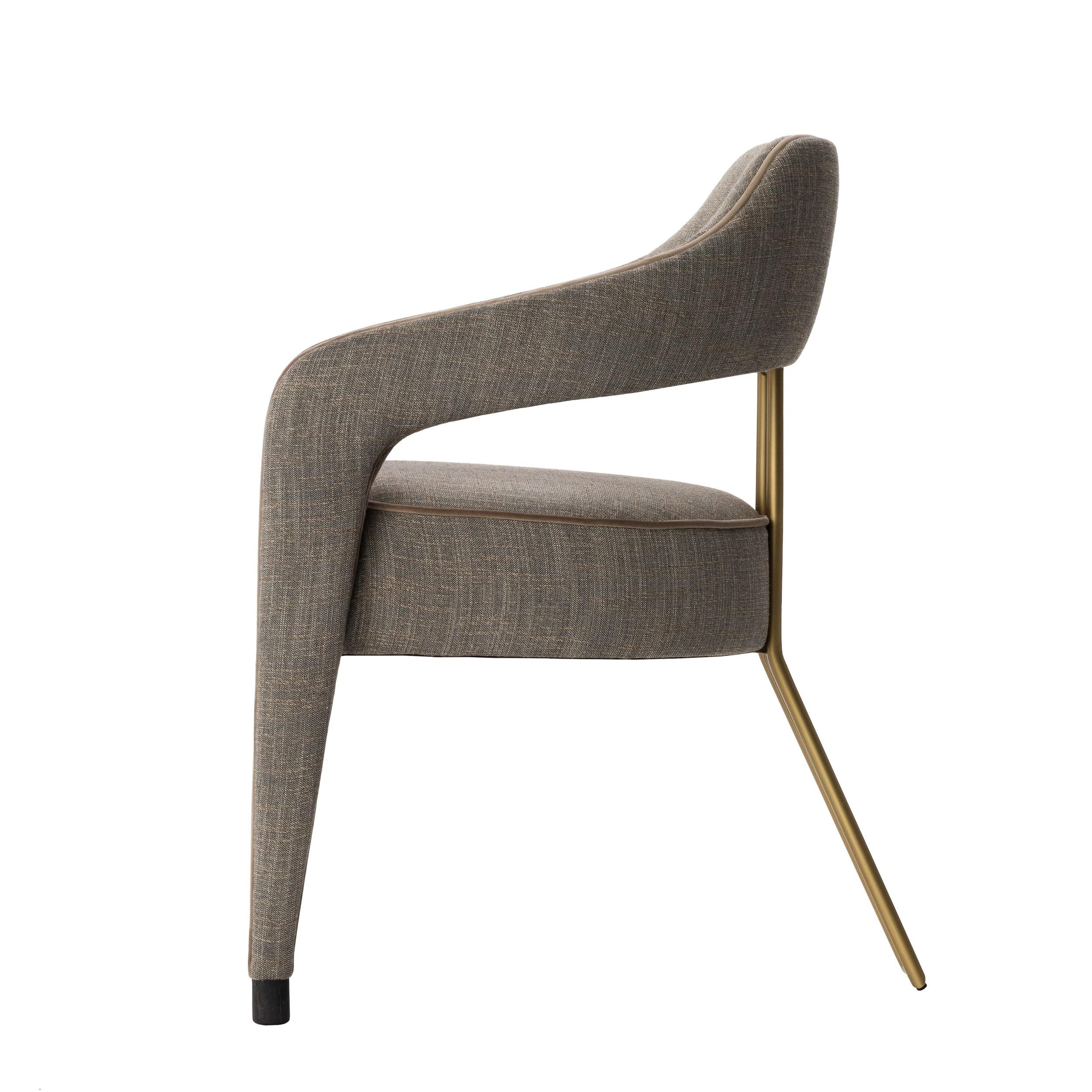Modern INVICTA II dining chair with brass rear leg For Sale