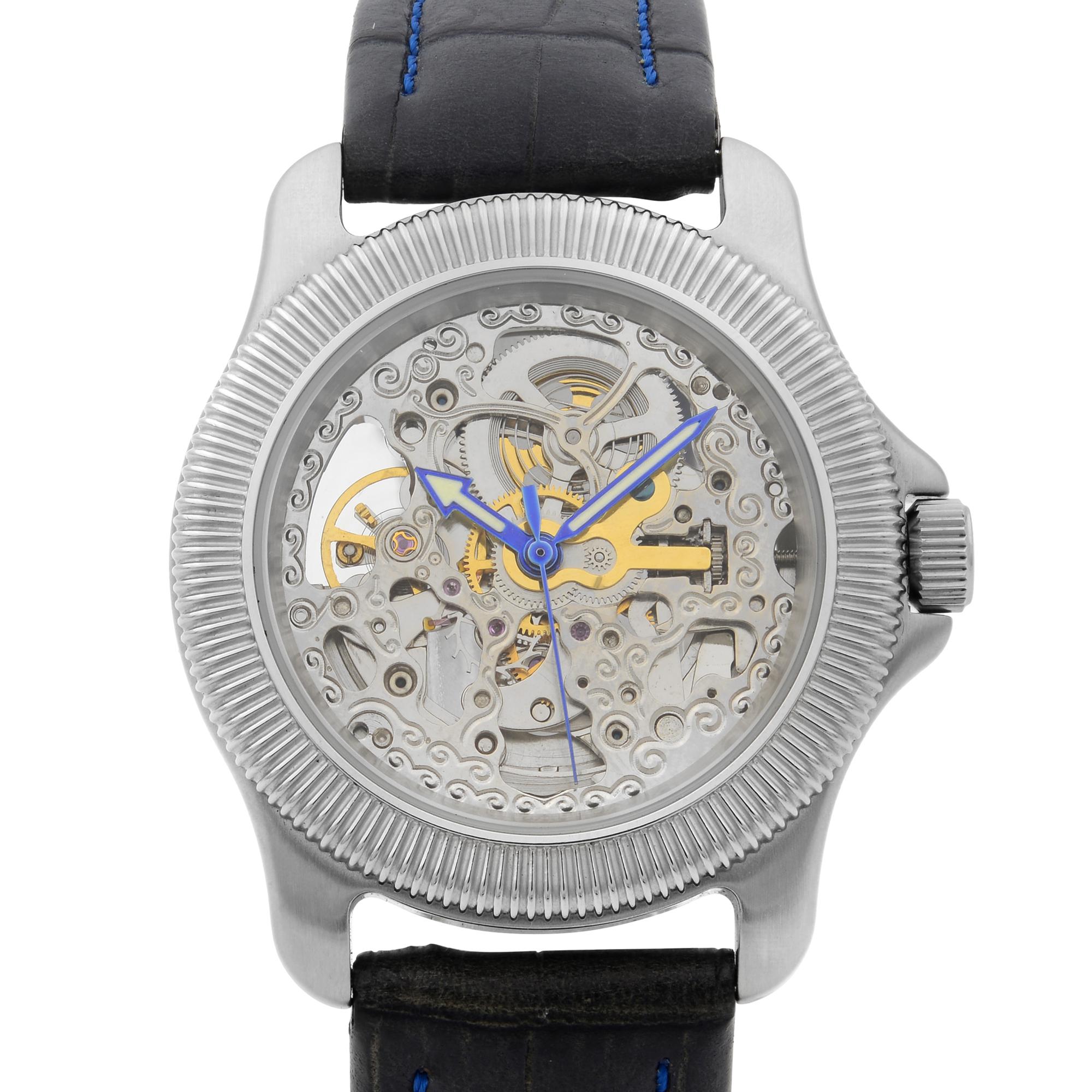 This display model Invicta Skeleton  N/A is a beautiful men's timepiece that is powered by mechanical (automatic) movement which is cased in a stainless steel case. It has a round shape face, no features dial and has hand unspecified style markers.
