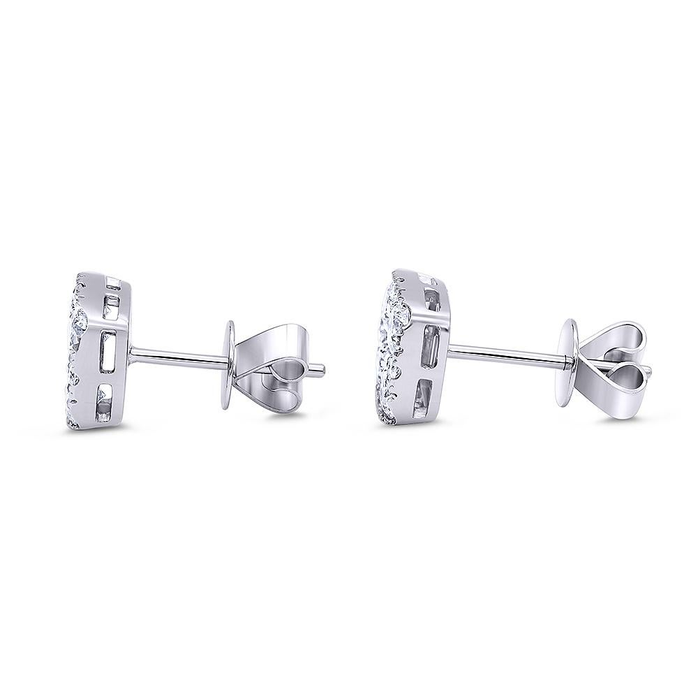 Ladies Beautiful diamond Earrings. Handcrafted in 14k white gold. The center contains 8 large round brilliant diamonds, surrounded with small diamonds.Total of the diamond weight is 2.0 carat .SI1 / SI2 clarity G-H color. Square shaped,invisible