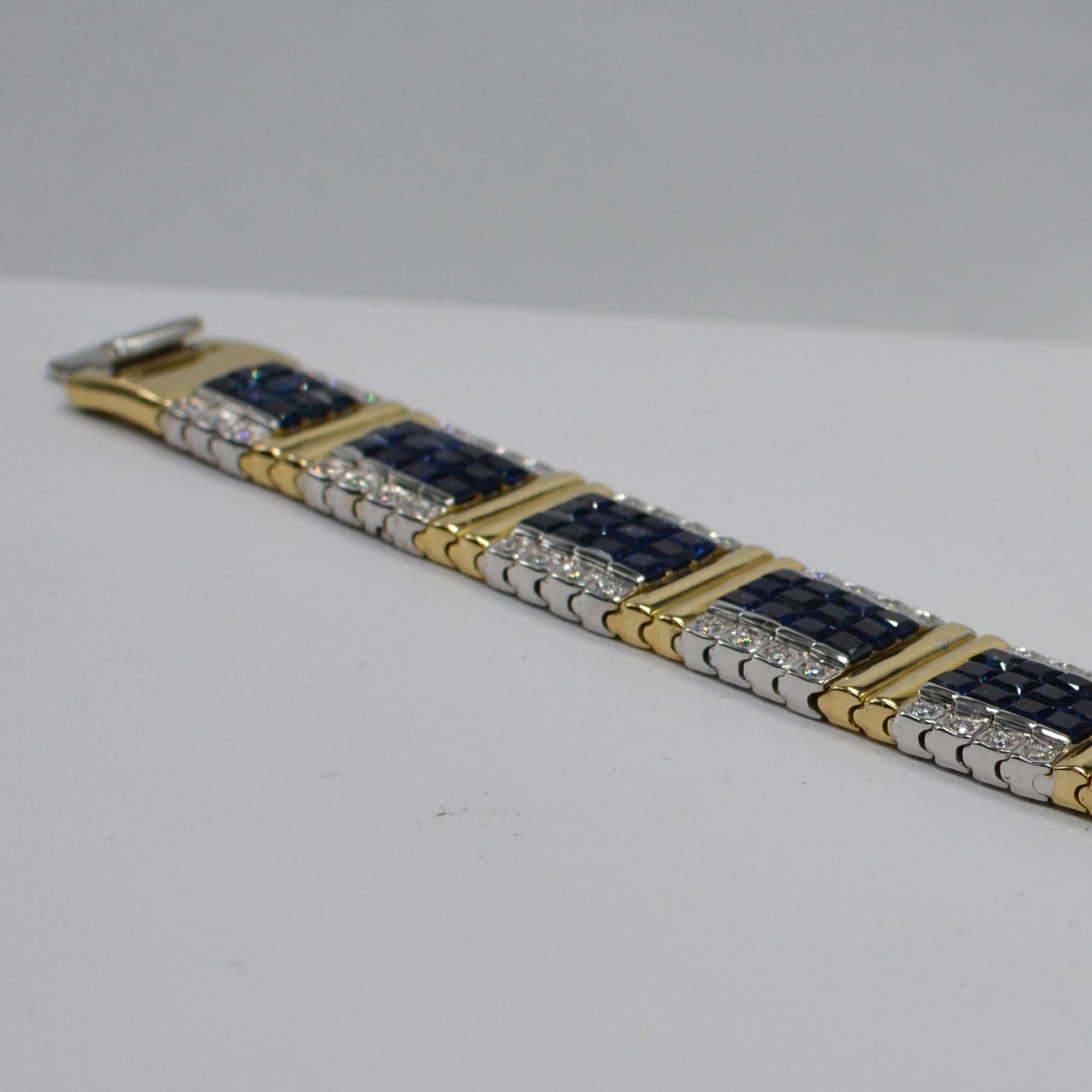 Unique Two Color Gold 
Blue sapphire Invisible Bracelet AAA Quality Sapphires Total of 18.00 carat.
with Diamonds on the sides total of 1.90 carat  GH-VS.
14K White & Yellow Gold 44.0 Grams.
Lenght 6.75' Inch.
Bracelet width is approx 13 mm
