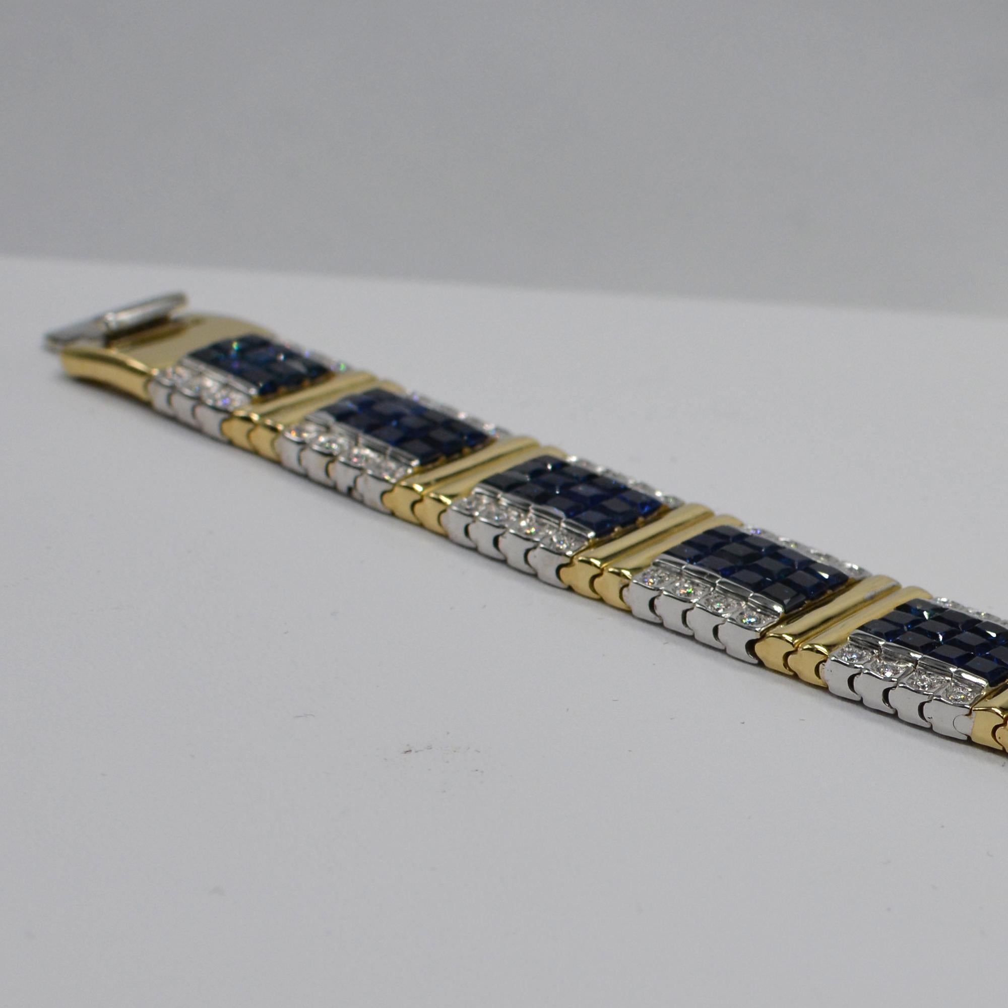 Unique Two Color Gold 
Blue sapphire Invisible Bracelet AAA Quality Sapphires Total of 18.00 carat.
with Diamonds on the sides total of 1.90 carat  GH-VS.
14K White & Yellow Gold 44.0 Grams.
Length 6.75' Inch.
Bracelet width is approx. 13 mm
