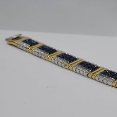 Bracelet en or bicolore 14 carats avec saphirs bleus invisibles