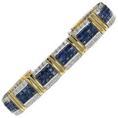 Retro Invisible Blue Sapphire Bracelet 14 Karat Two-Tone Gold with Diamonds