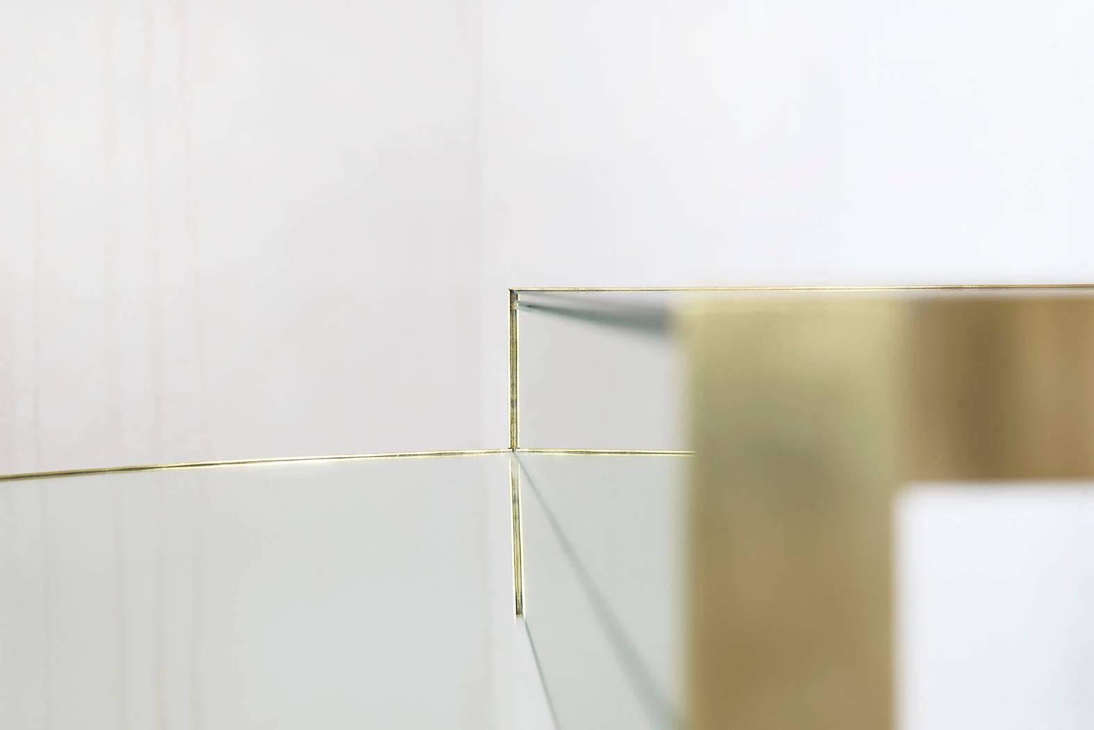 Dimensions: L 50cm, W 50cm, H 55cm
Materials: Brass and mirror

Invisible side table
“Invisible Side Table “by Rooms, blends conceptual with the simple. Using mirror and brass, the piece feels like a chameleon vanishing into the surroundings.