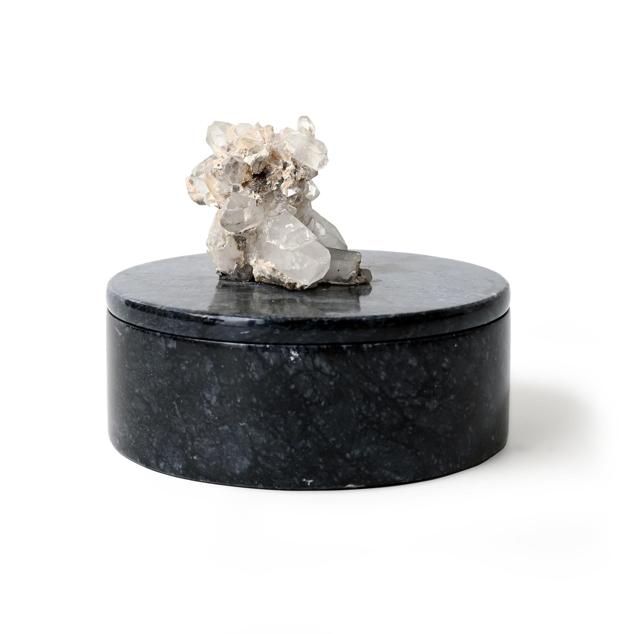 Invisible Cities Box III by Studio Lel
Dimensions: D 13 x H 8 cm
Materials: Crystal quartz, marble.

These are handmade from semiprecious stone and marble in a small artisanal workshop. Please note that variations and slight imperfections are part