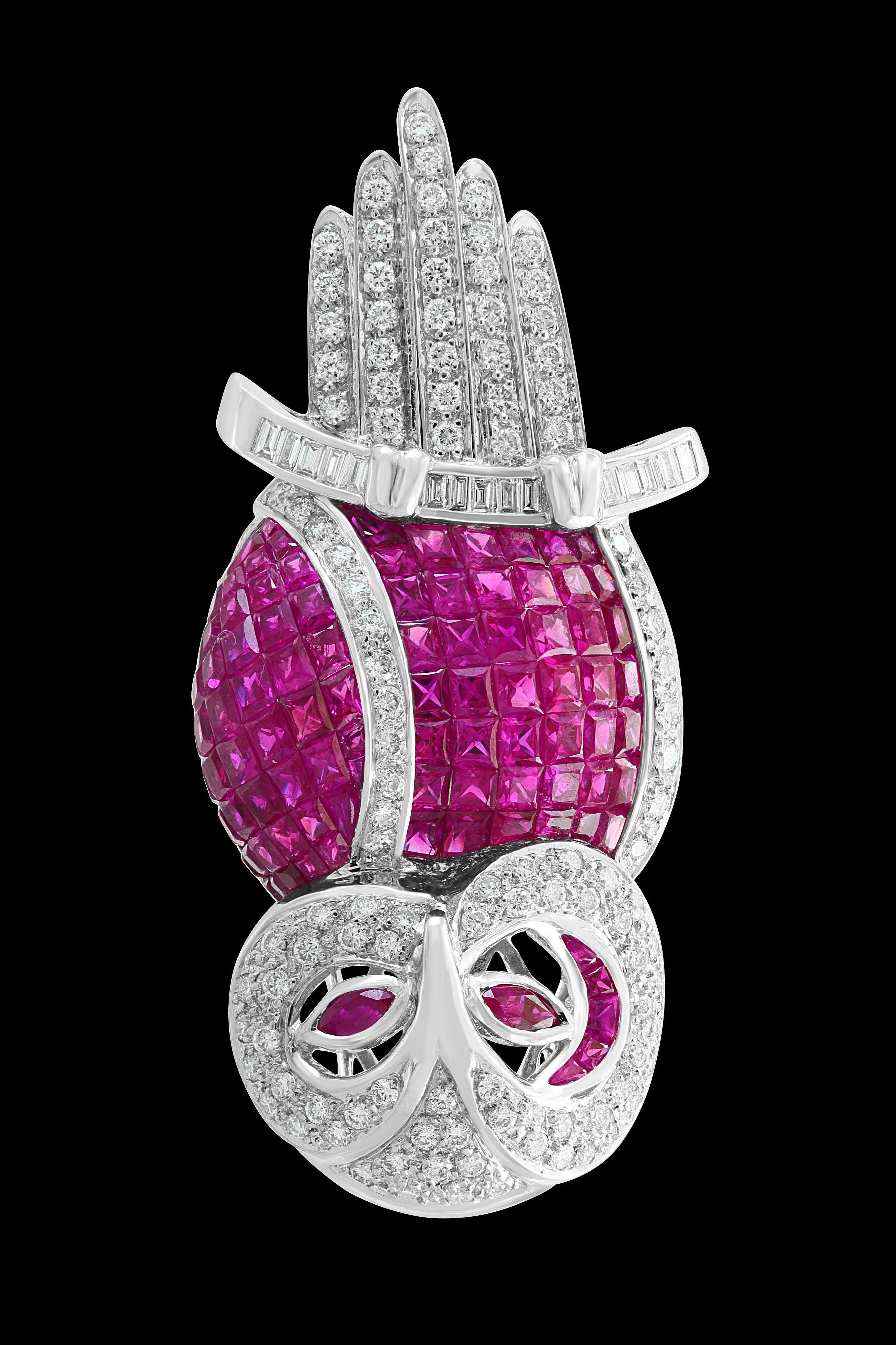 Invisible or Mystery set  Princess cut  Burma Ruby  And  Diamond  Owl Pin/ Pendant  in 18 K  White Gold .
18 K gold 24 Grams
 Diamonds: approximate 6.5 carat , VS Quality G color
 Ruby  natural  : approximately 10.5 Ct .
Origin : Burma
This owl pin