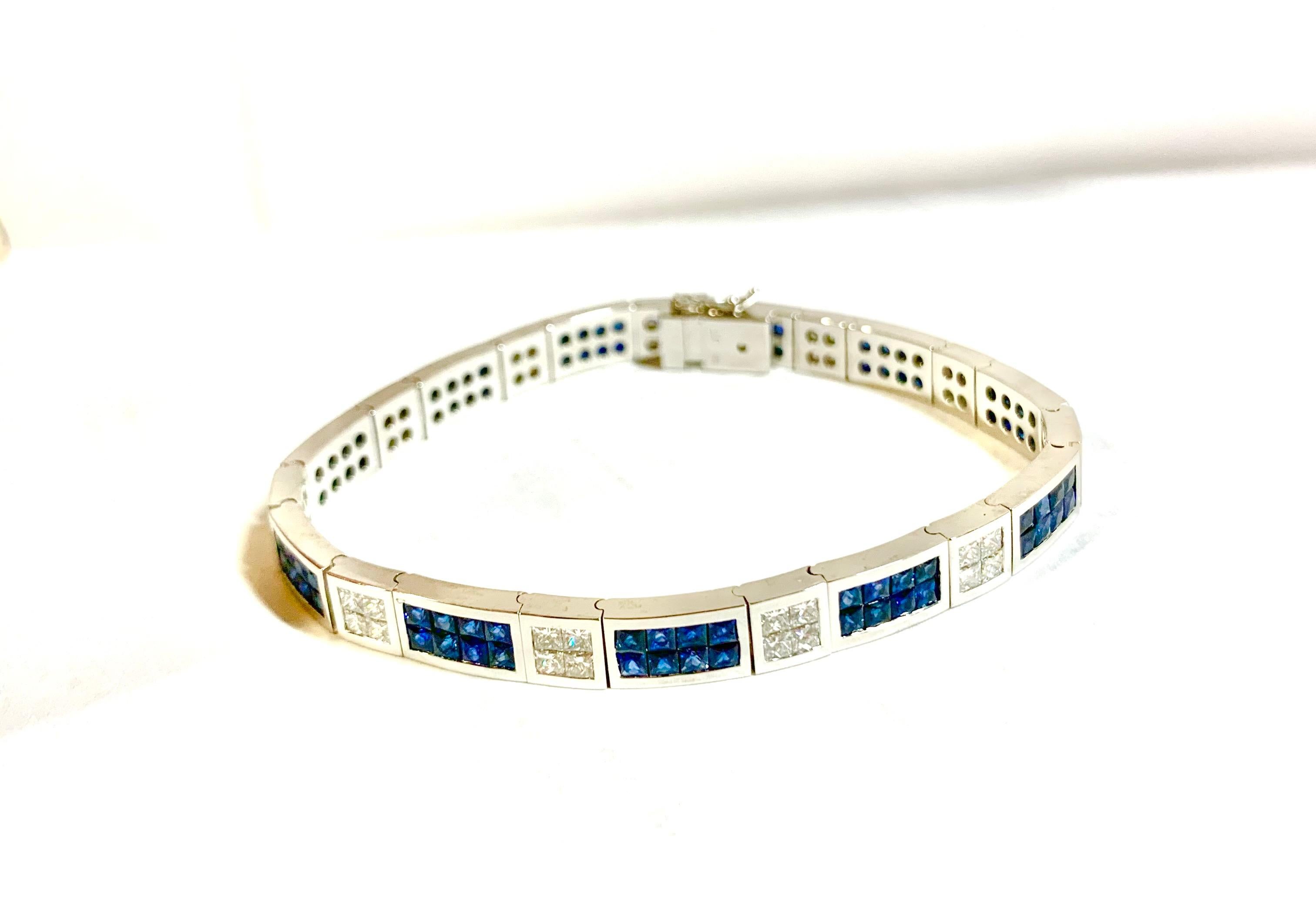 Invisible set sapphire and diamond bracelet made of 18k white gold

Stones: Blue Sapphire
Stone Shape: Princess
Stone Carat: 6.50 Carat 
Stone Setting Style: Invisible Set 
Stones: Diamonds
Stone Shape: 44 Princess Cut
Stone Weight: 3.00 Carat