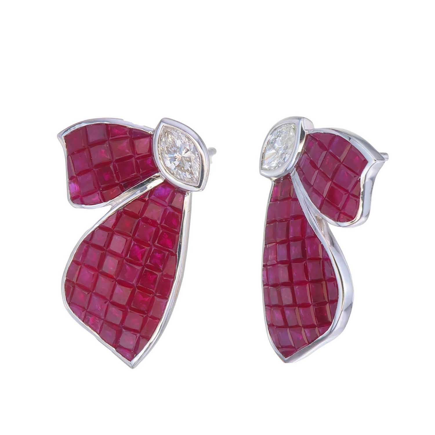 Invisible set ruby butterfly earrings are given form by precious ruby stones from East Africa and  Marquise diamond
A tribute to  feminine beauty embodied in the most delicate and mesmerizing creature in nature, the butterfly.
This collection
