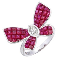 Bague papillon en rubis serti invisible avec un diamant