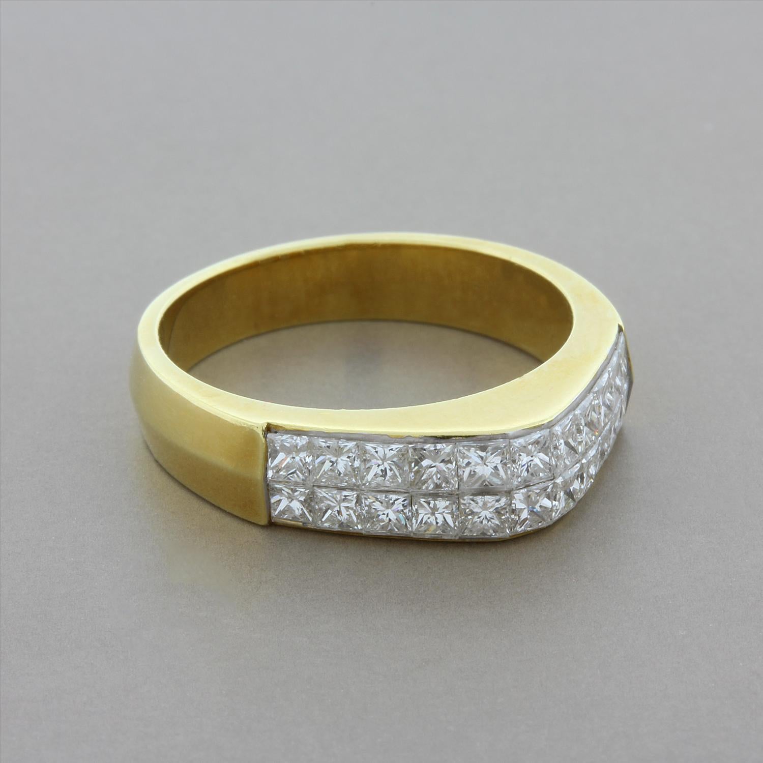 This elegant ring features two rows of princess cut diamonds invisible set in an 18K yellow gold setting. The domed triangular center makes this ring stand out from the rest.

Ring size 6.25

