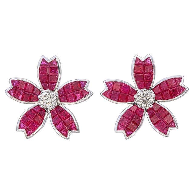 Invisible set floral Ruby bracelet with diamond studded triple coil ...