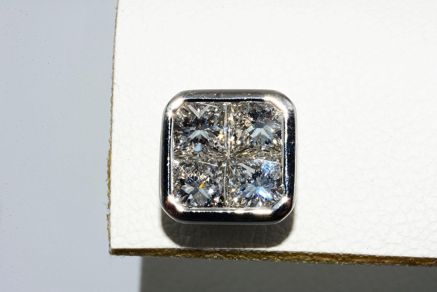Invisible Set Princes Cut Diamond Studs 18K White Gold

Princess Cut Diamonds 2.48ct  F VS1
18K White Gold
Push Back