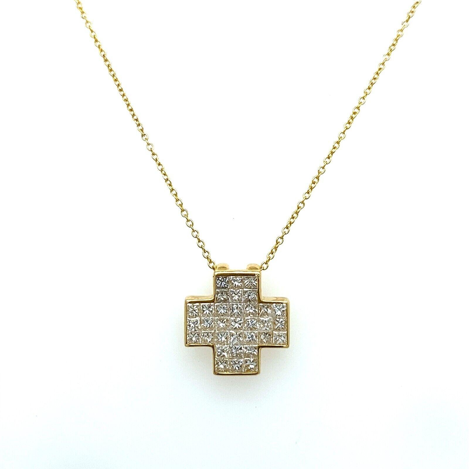 This exquisite cross pendant is made of 18ct yellow gold, with a total weight of 1.30ct princess cut diamonds. The diamonds are invisible set, suspended on 16