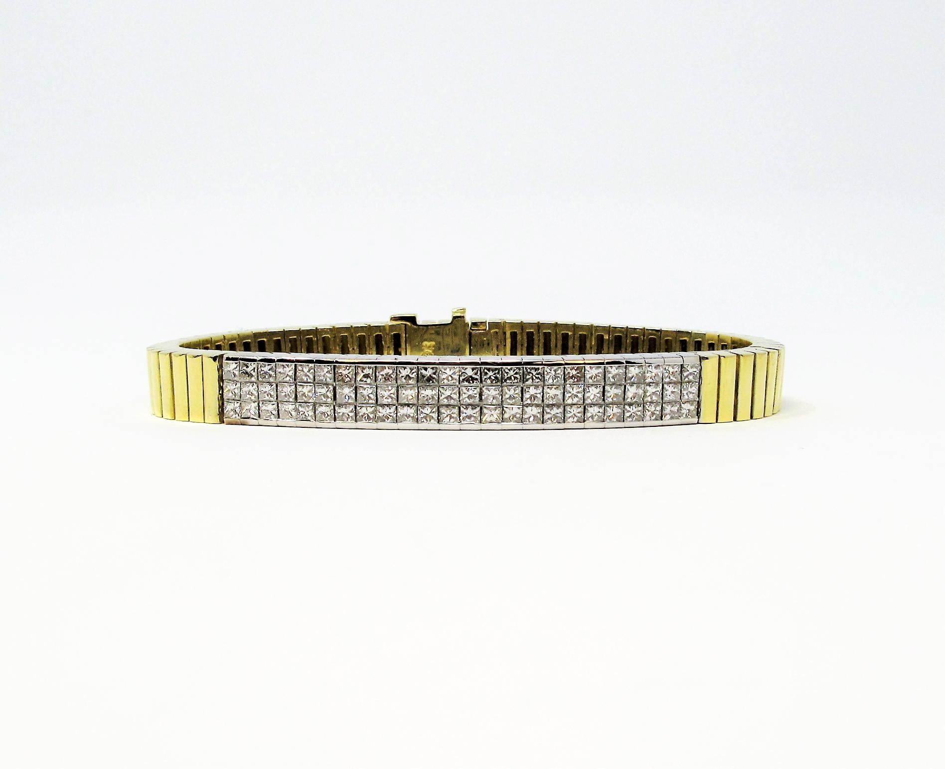 This incredible two-tone princess cut diamond link bracelet will line your wrist in pure elegance. The sleek design of this gorgeous piece can be dressed up or down, and the multi-tone gold arrangement works well with a variety of different looks.