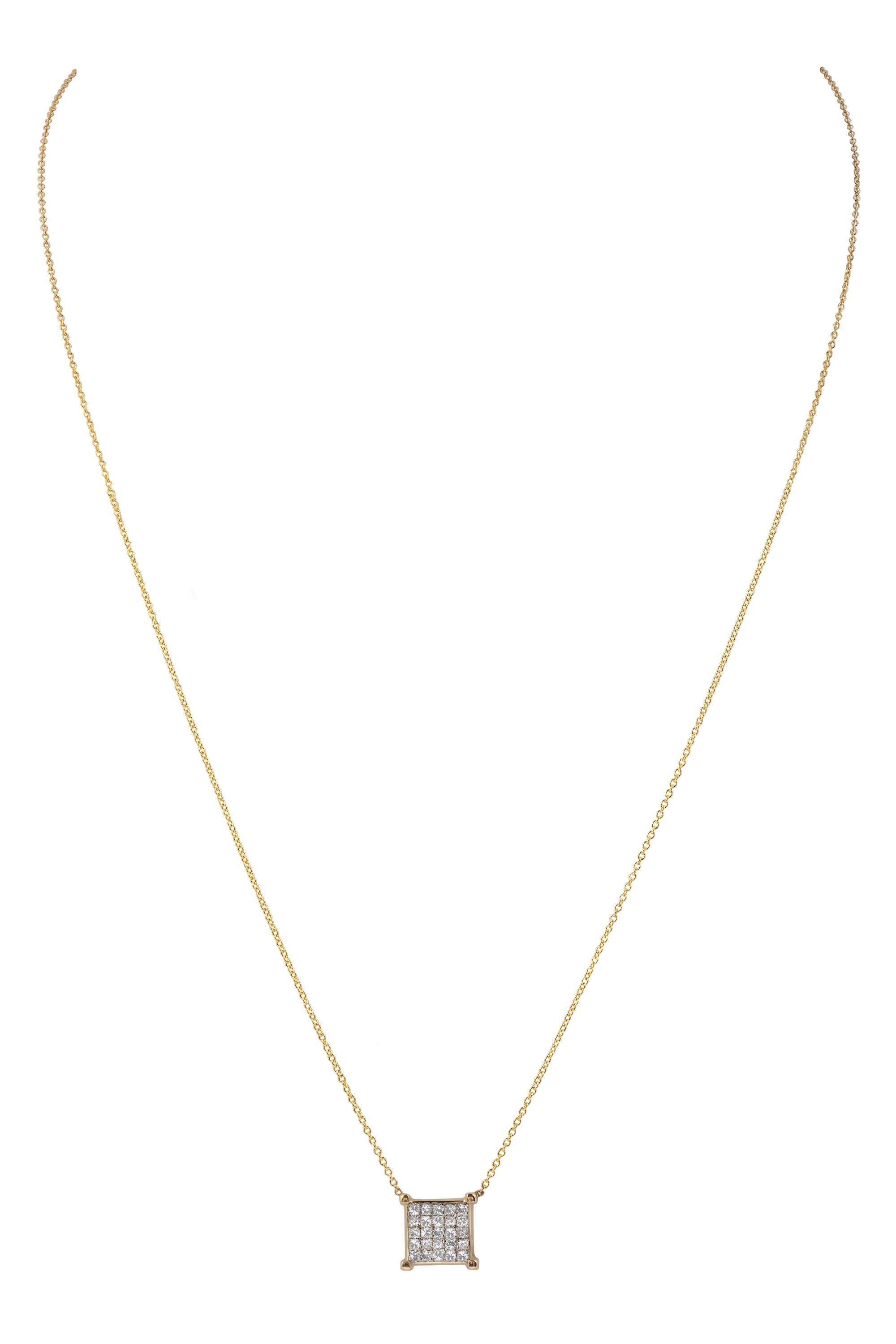 A sleek gold frame borders a perfect square of radiant invisibly set princess cut diamonds in this chic and elegant 14 karat yellow gold pendant necklace. Set with twenty-five princess cut diamonds G in color, VS in clarity, weighing approximately