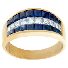 Vintage Invisible set princess cut sapphire & diamond ring in 18k yellow gold