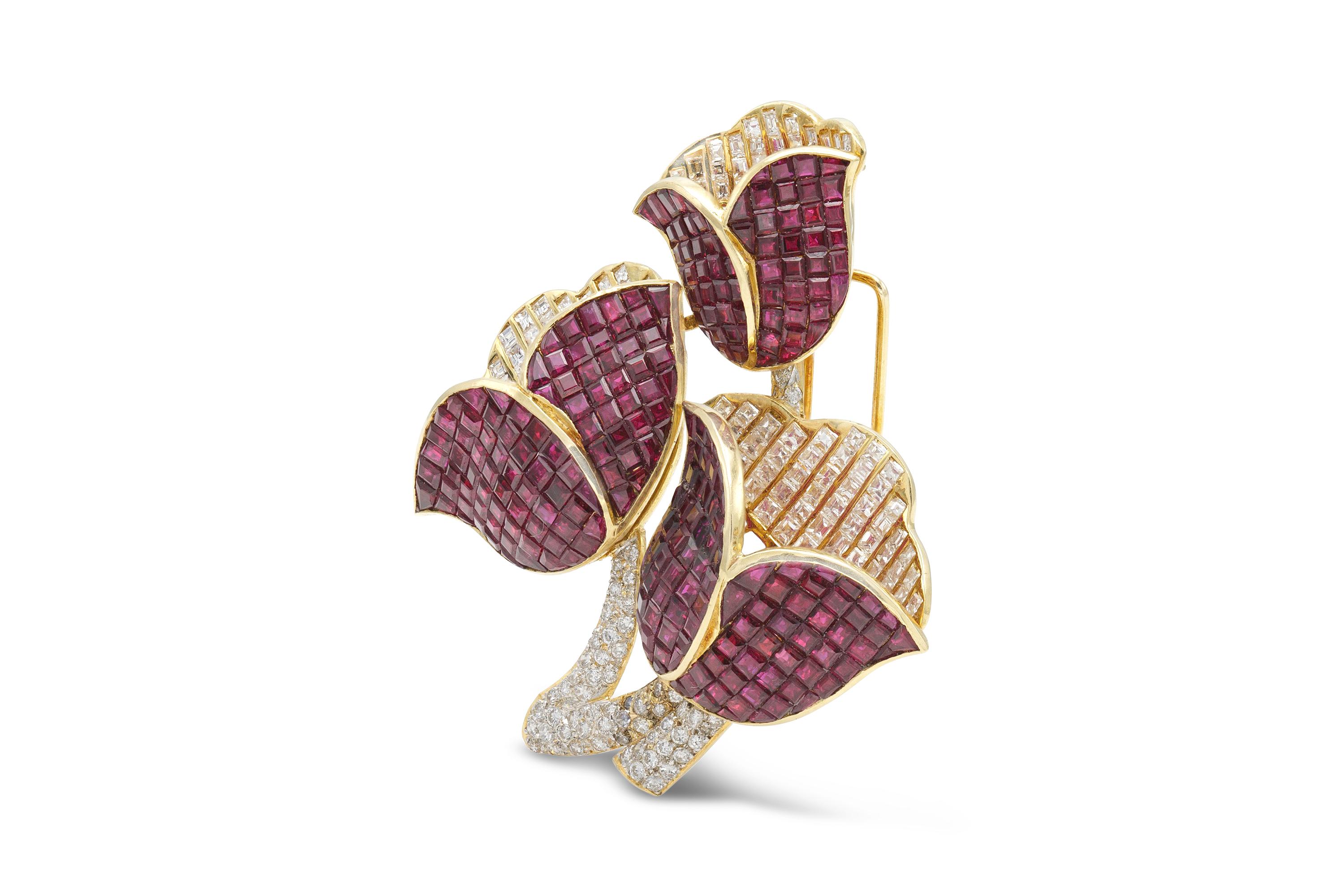 Finely crafted in 18k yellow gold with Square cut Rubies weighing approximately a total of 13.00 carats, Square and Round cut Diamonds weighing approximately a total of 10.00 carats.
Circa 1980s