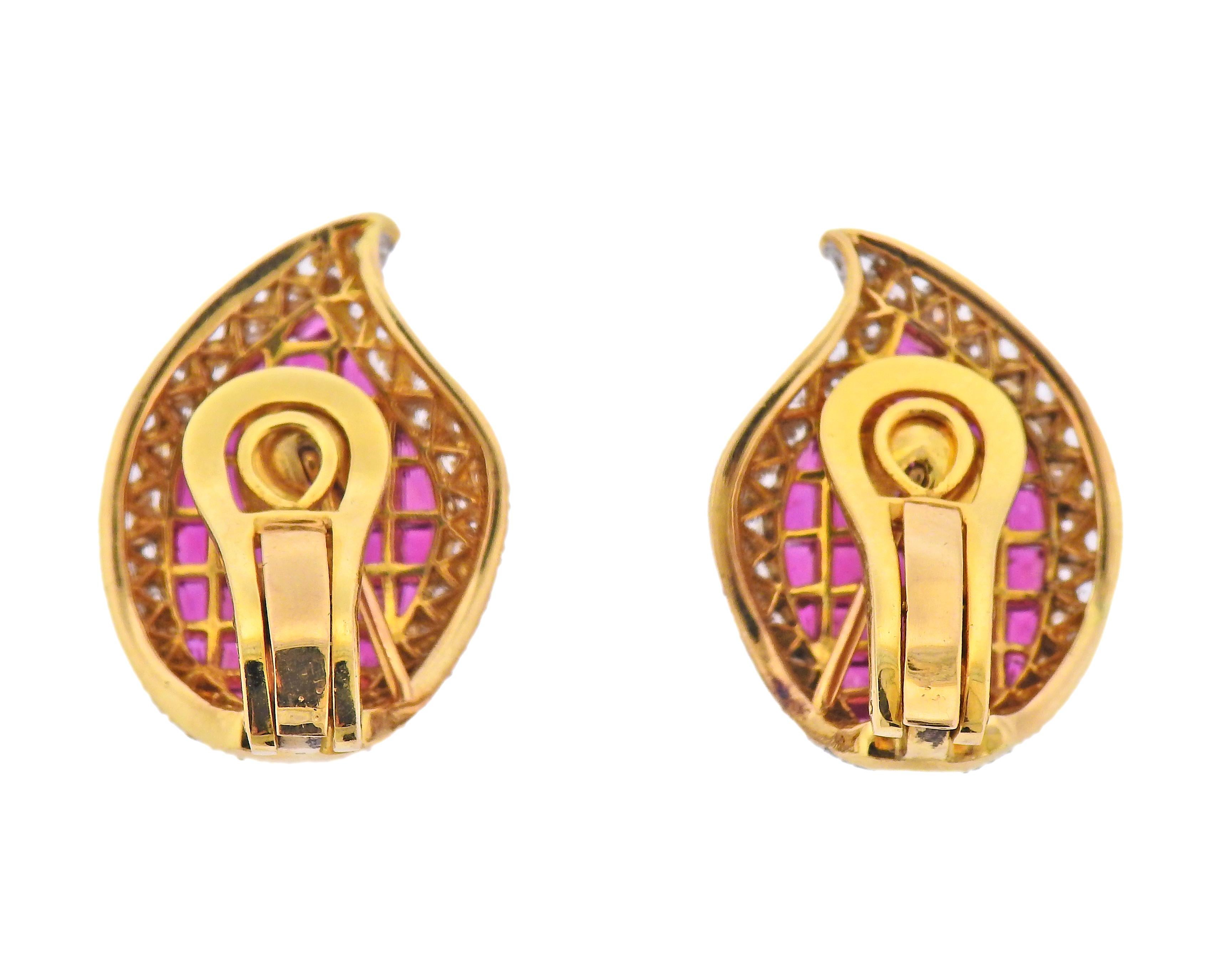 Pair of 18k gold earrings with invisible set rubies and approx. 1.60cts in diamonds. Earrings are 25mm x 17mm. Weight - 14 grams. 