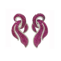 Invisible Set Ruby and Diamond Swirl Earrings