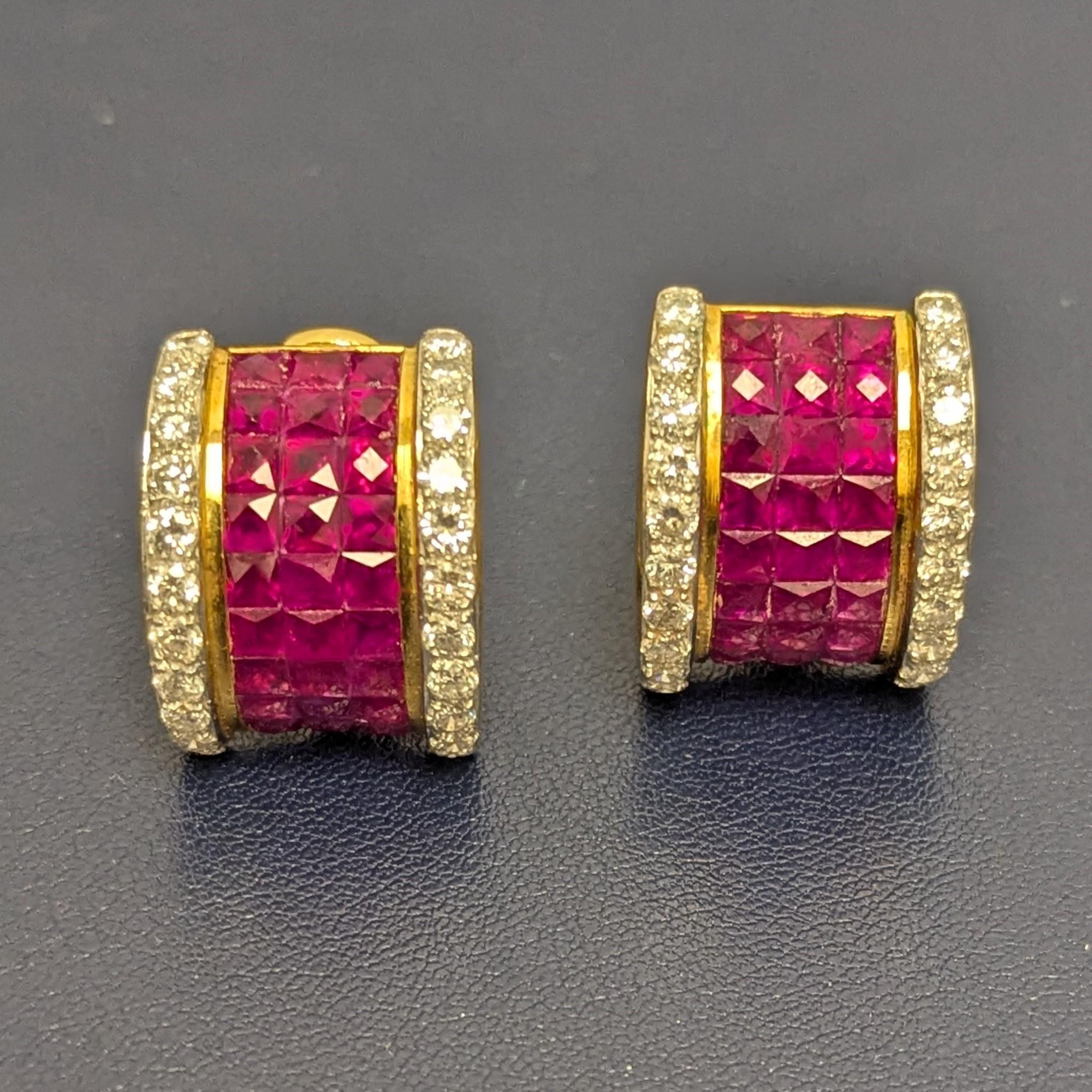 These earrings feature invisible-set square shaped rubies of a vivid pinkish-red color, encircled by round diamonds, set in yellow gold. These are clip-back earrings with a collapsible posts.

