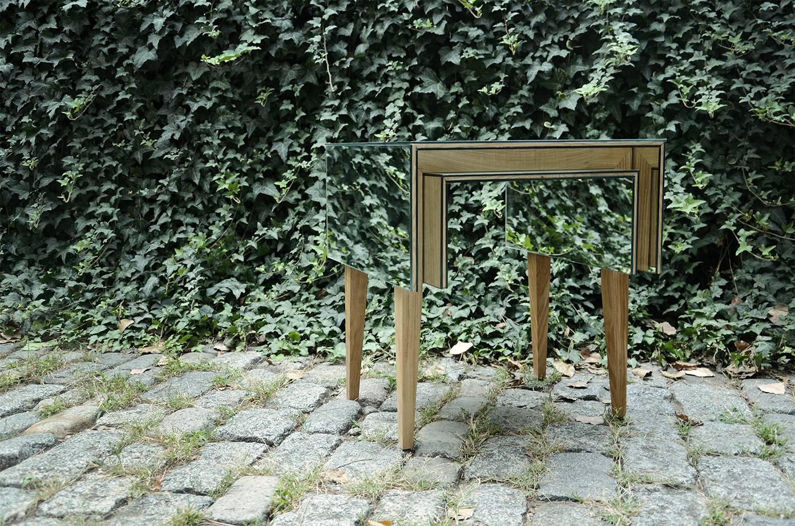 Dimensions: L 92cm, W 52cm, 60cm
Materials: Wood/mirror

Invisible table:
Invisible table by Rooms, blend mysterious with the simple. Using mirror and wood, these delicate tables act like a chameleons vanishing into the surroundings and appear