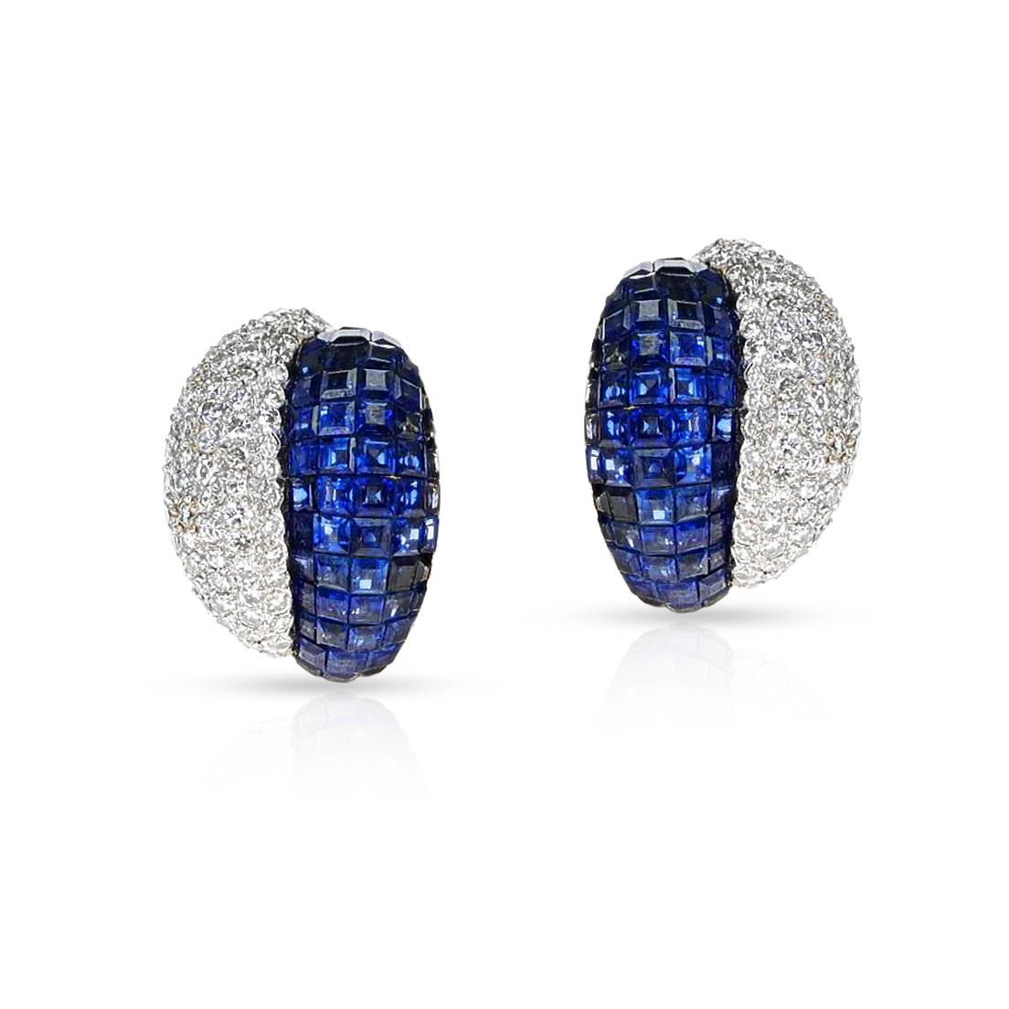 A breathtaking pair of Invisibly Set Blue Sapphire and Diamond Duo Earrings made in 18k gold. The total weight of the earring is 19.24 grams. 

SKU 1275-DGBERPL