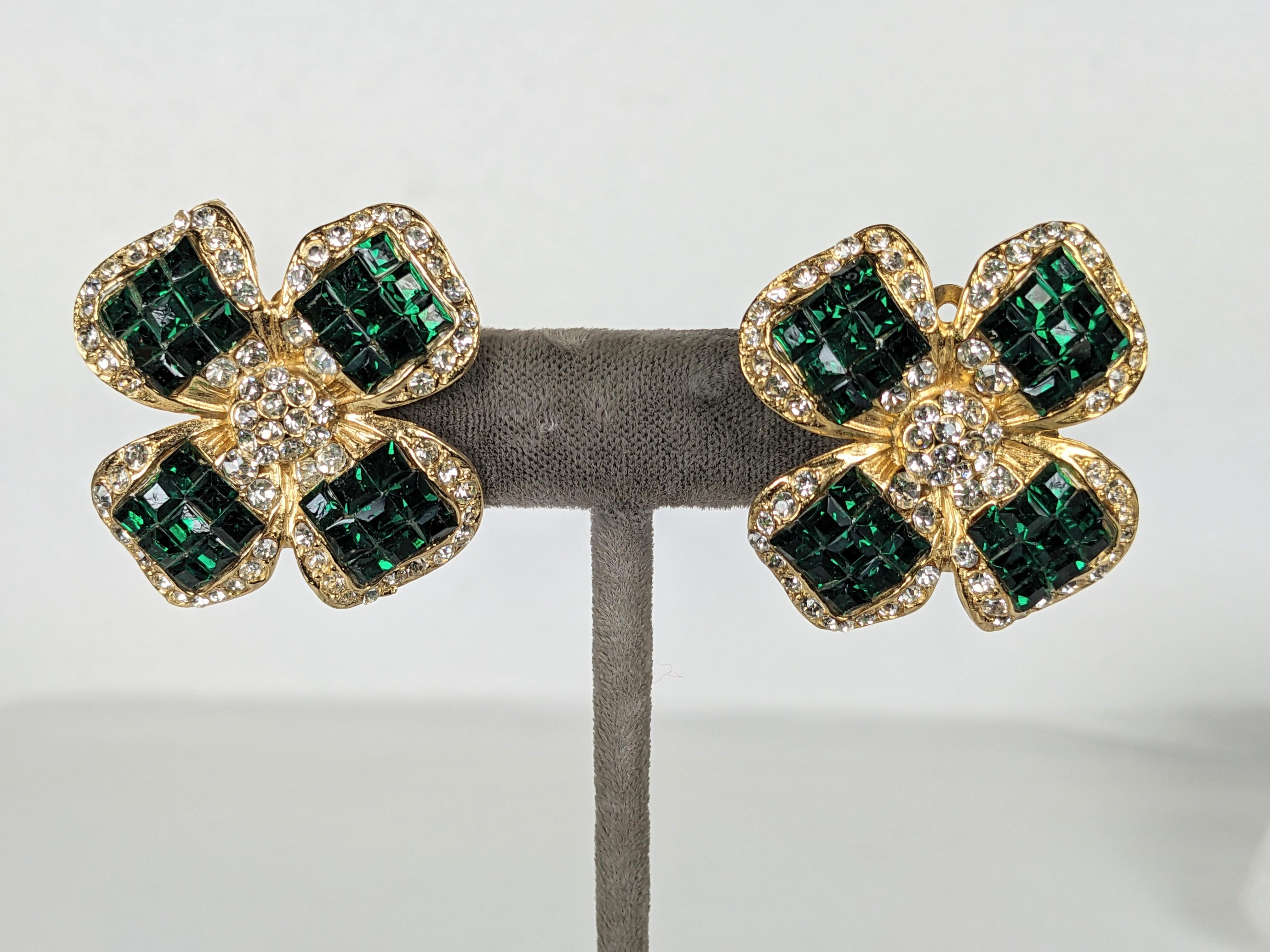 Invisibly Set Faux Emerald Flower Earrings from the 1990's. Clip back fittings with square cut emerald paste trimmed with crystals in gilt metal. 1990's USA. 1.25