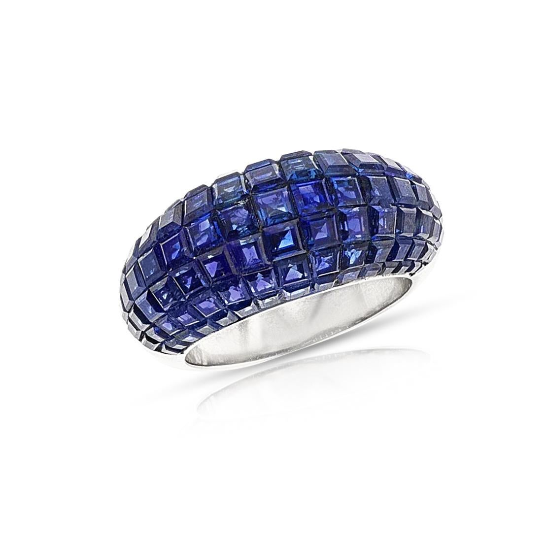 An intricately-made Invisibly Set Natural Sapphire Ring made in 18k white gold. The ring size is US 6. The total weight is 9.10 grams.