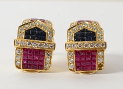 Invisibly Set Ruby and Diamond Buckle Gold Earrings