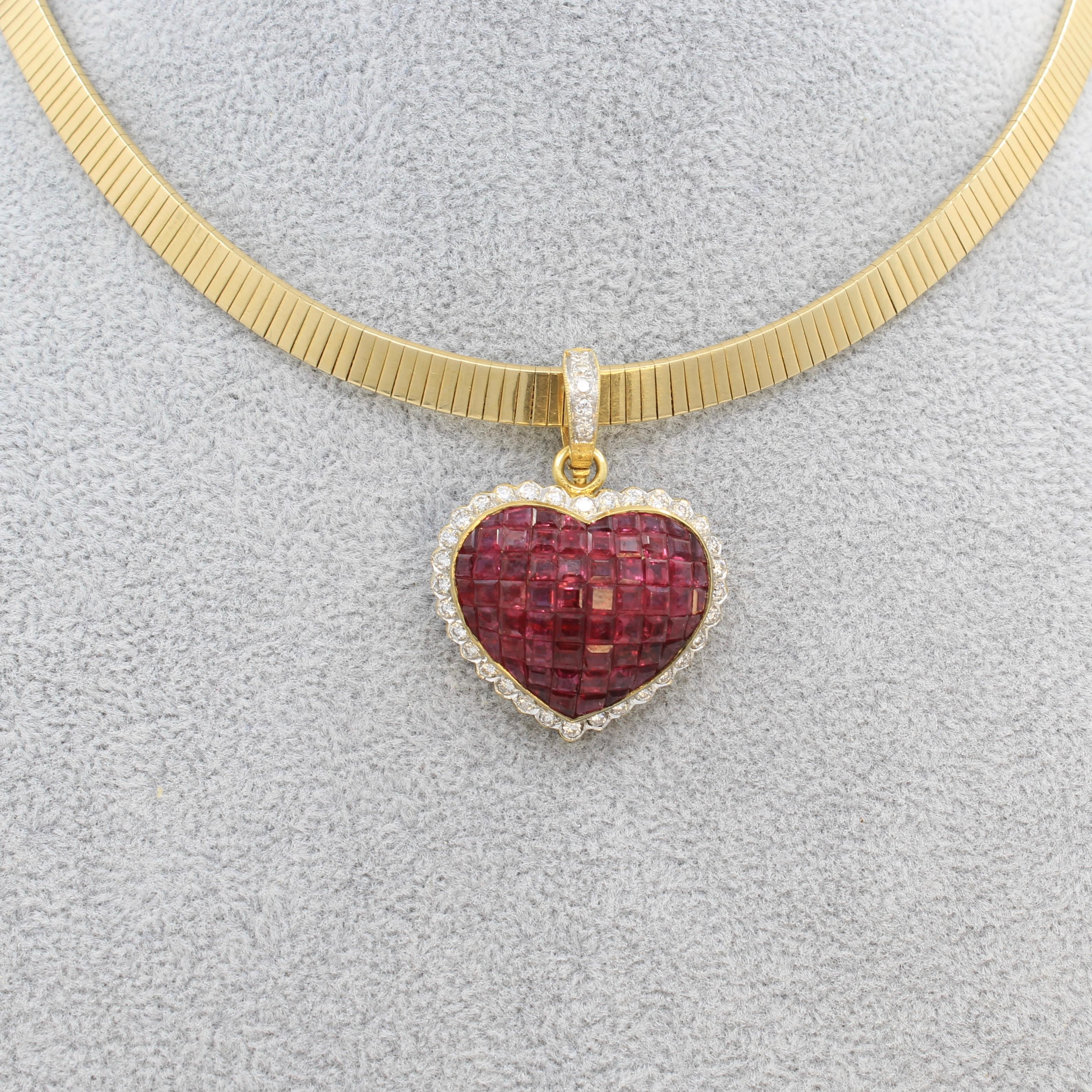 An absolutely gorgeous invisible set ruby heart pendant with accent diamonds. It is has a large latching bail that easily fits most omega necklaces and large chains. The bright red natural rubies are perfectly set within the heart shaped pendant.