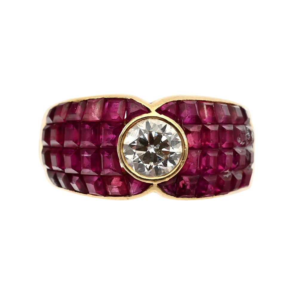 Invisibly Set Ruby Ring with Diamond Center For Sale