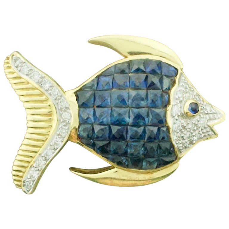 Invisibly Set Sapphire and Diamond Fish Brooch in 18 Karat Yellow Gold For Sale